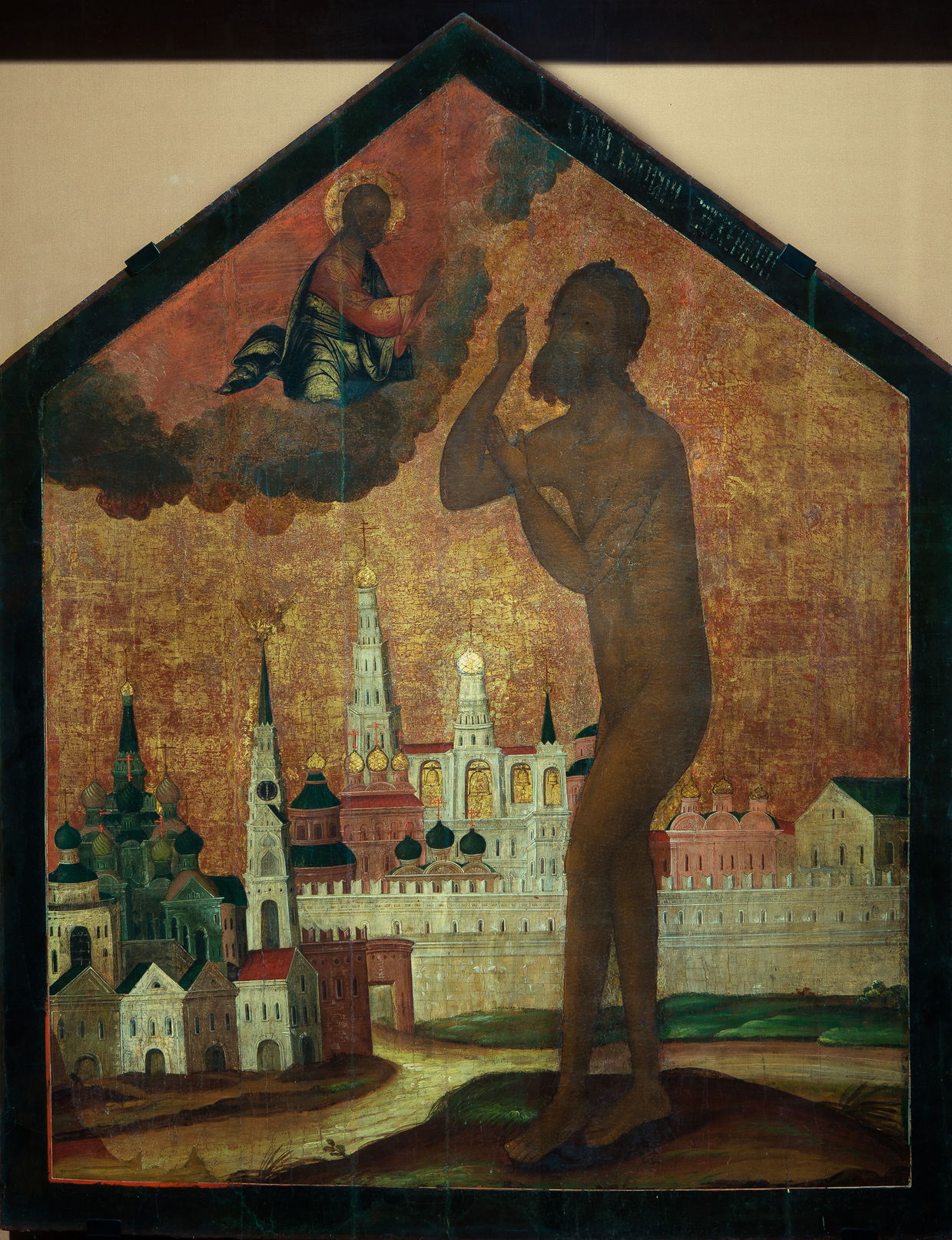 Икона «Святой Василий Блаженный на фоне Покровского собора»